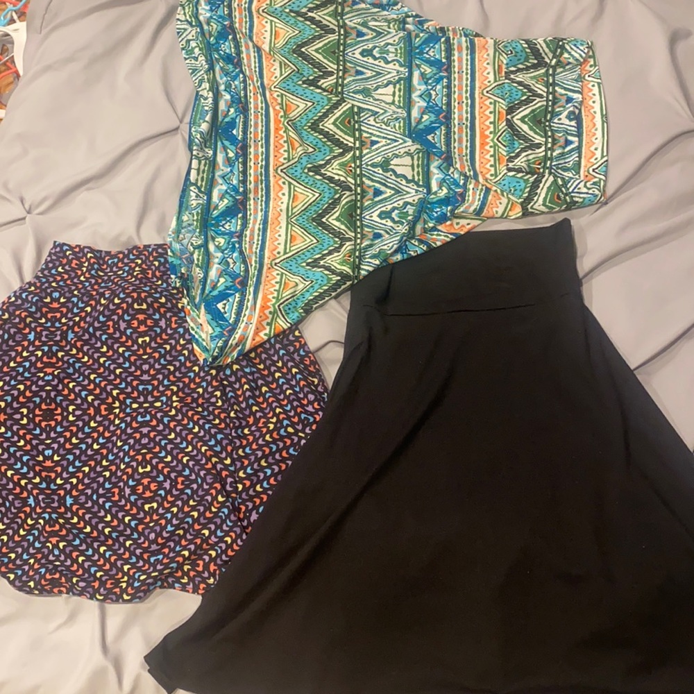 three lularoe skirts in kneelength flowy two jersey one silky